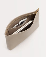 Pouch with phone and earphones inside, viewed from above.
