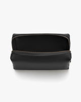 Open toiletry bag with a zipper viewed from above.