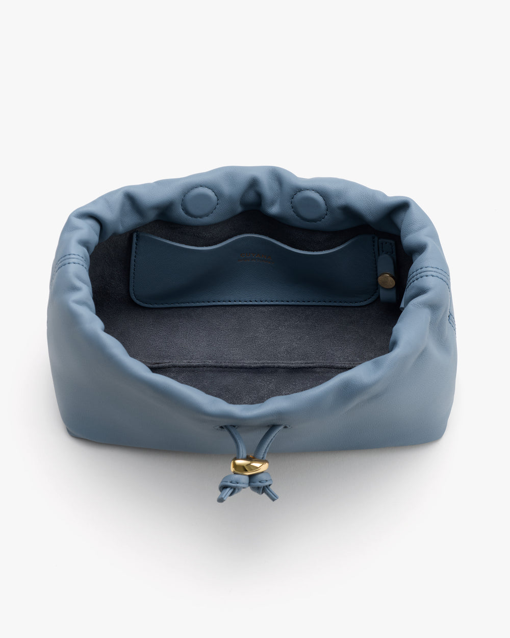 Open drawstring bag with interior pocket and small button closure.