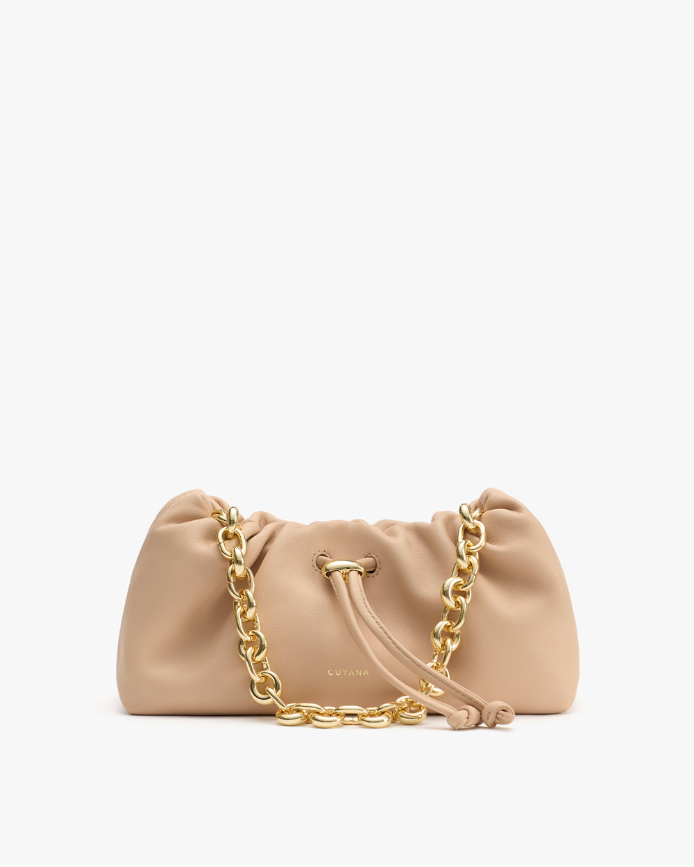 Handbag with chain strap and drawstring closure on display