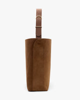 Tall bag with a wide strap and a smooth finish.