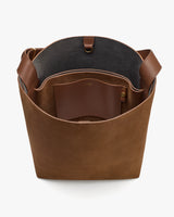 Open tote bag with interior pocket and shoulder strap.