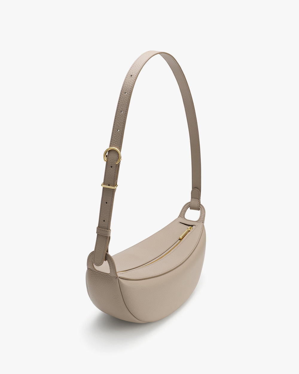 Shoulder bag with a curved shape and adjustable strap.