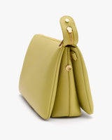 Structured handbag with zipper detail shown from side.