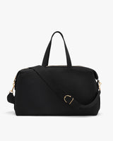 Travel bag with handles and detachable shoulder strap.