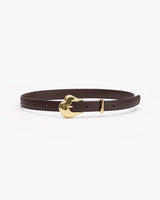 Belt with gold buckle.