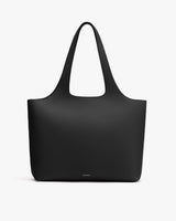 Simple tote bag with wide shoulder straps.