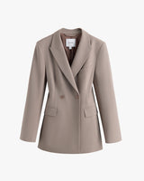 Tailored double-breasted blazer with two buttons and notched lapels.
