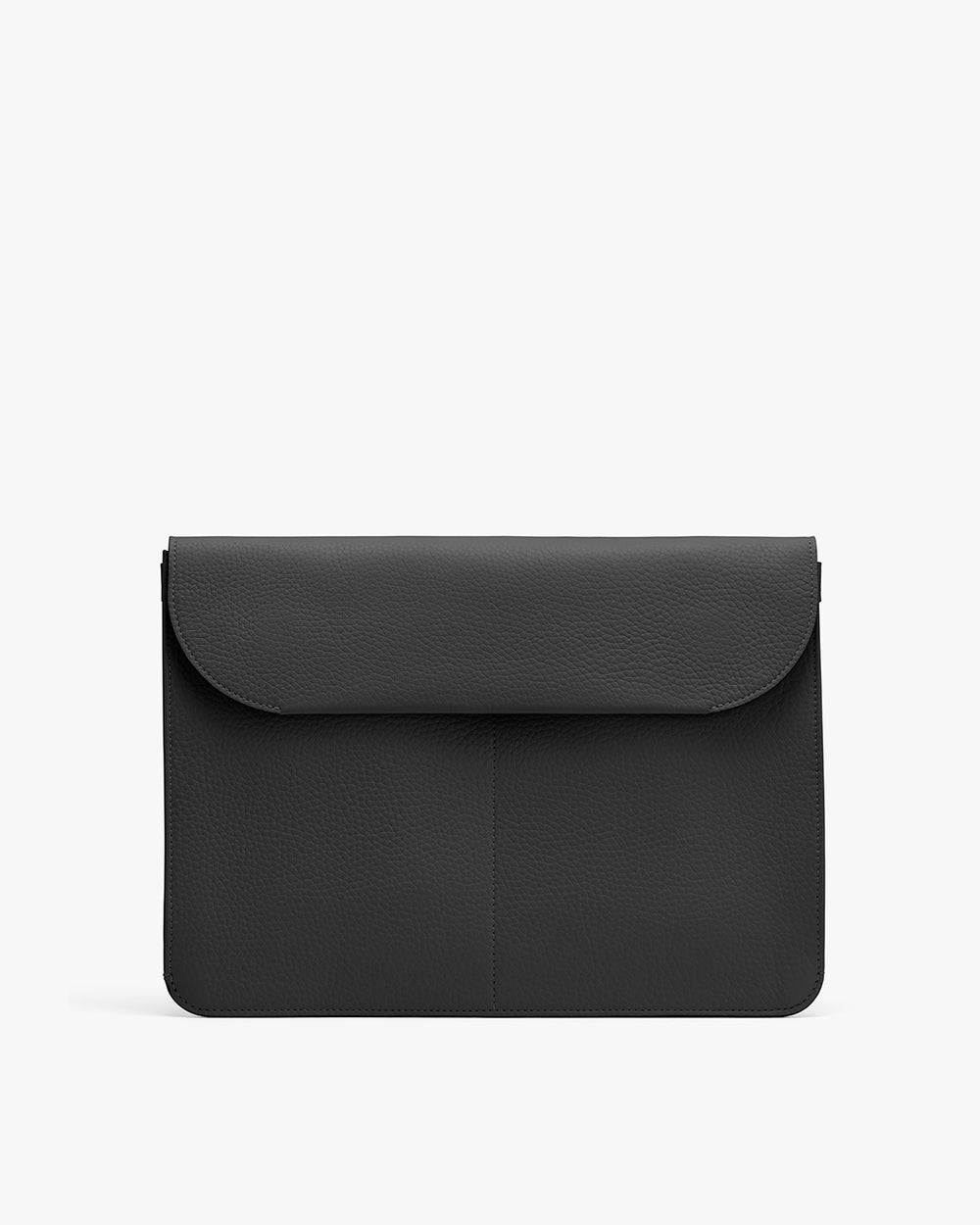 Plain handbag with a flap closure on a light background.