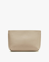 Leather pouch on a plain background