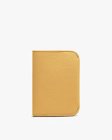 Leather wallet on a plain background.