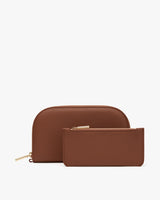 Two zippered pouches, one larger and one smaller, placed side by side.