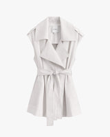 Sleeveless blouse with a collar, belt, and front lapels.