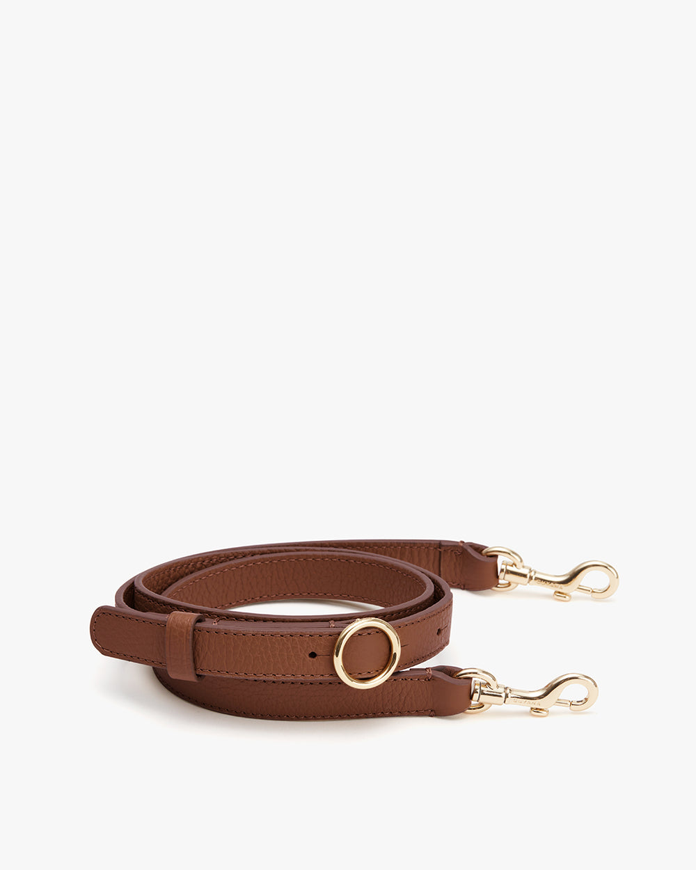 Rolled handbag strap with metal clasps and a circular buckle.