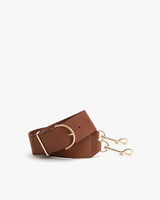 Wide leather strap with gold hooks and belt loop.