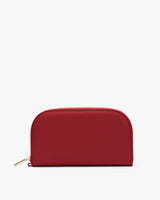 Rectangular zippered wallet standing upright.