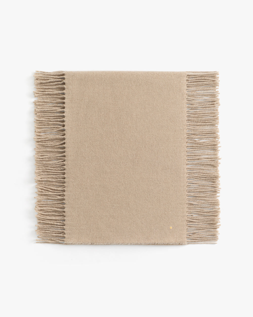 Rectangular scarf with fringed edges.