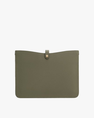Rectangular leather pouch with button strap closure.