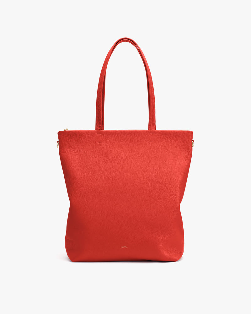 Tote bag with two handles standing upright.