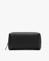 A toiletry bag with a zipper on a plain background.
