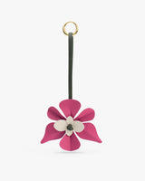 Flower-shaped keychain with a loop at the top.