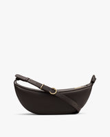 Shoulder bag with adjustable strap and gold buckle detail.