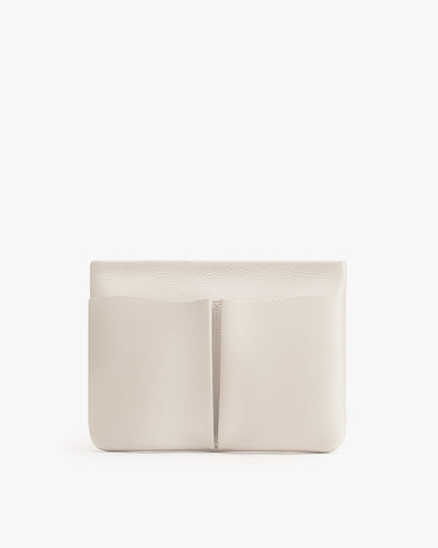 Rectangular clutch bag with vertical seam detail upfront.