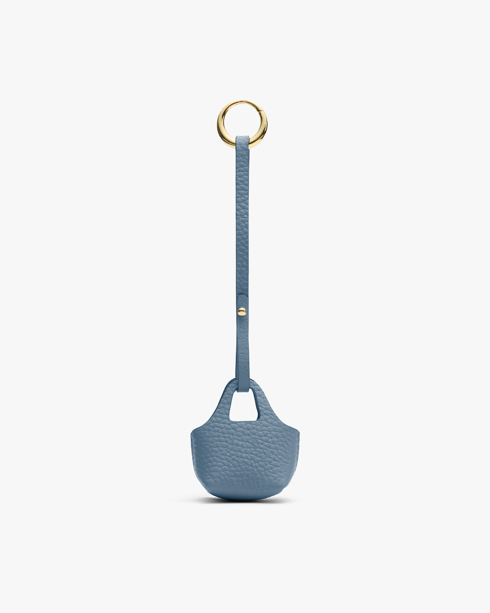 Small textured bag with long strap and metal ring attachment.