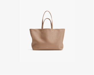 Tote bag with two handles on a white background.