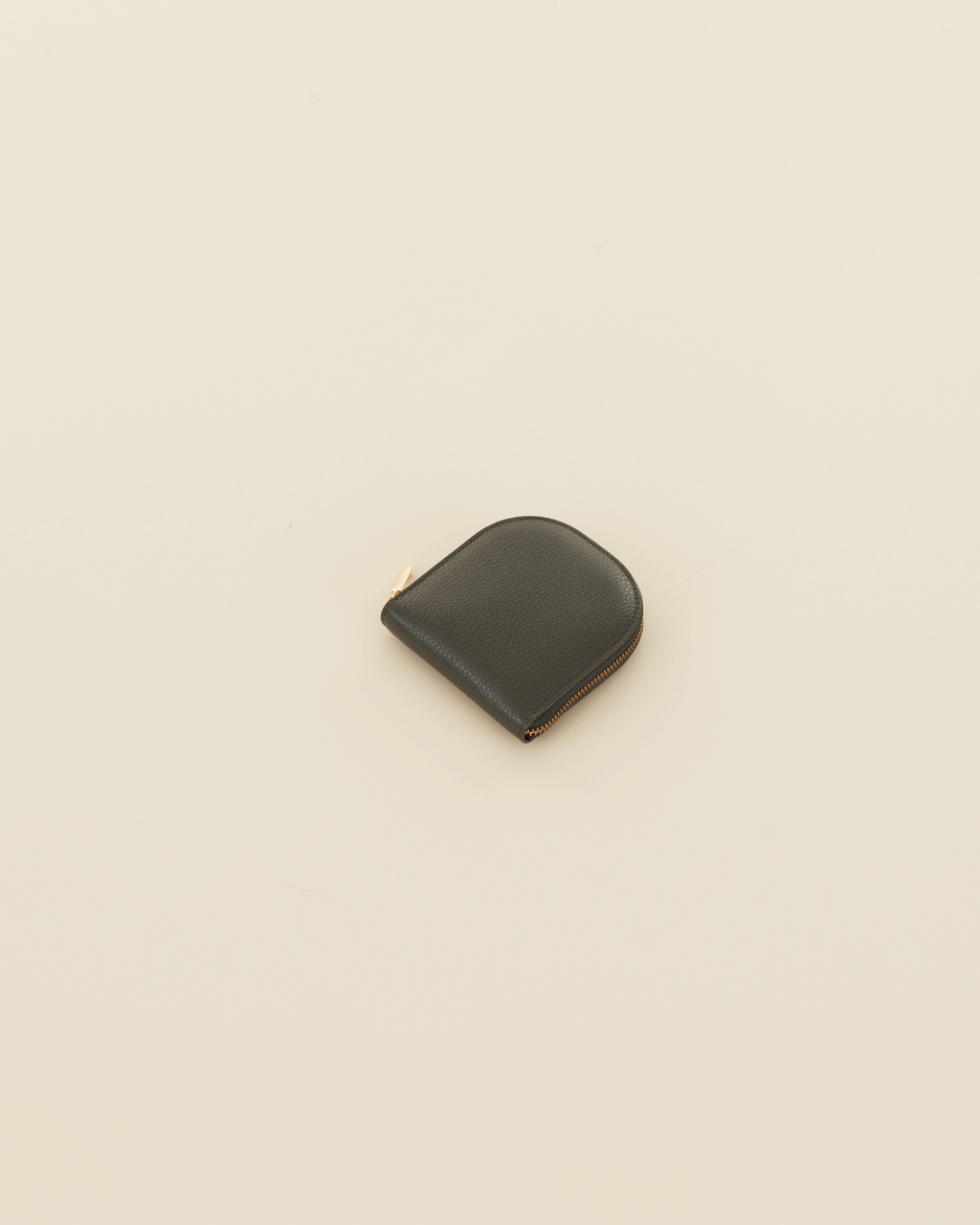Wallet placed on a plain surface.