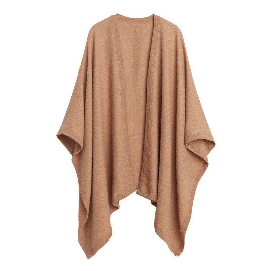Cape hanging against a plain background.