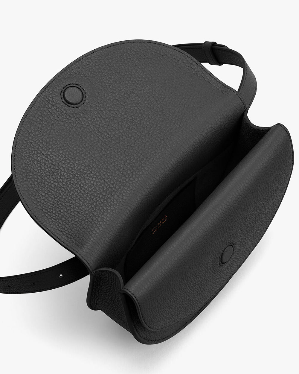 Top-down view of an open leather purse with a shoulder strap.