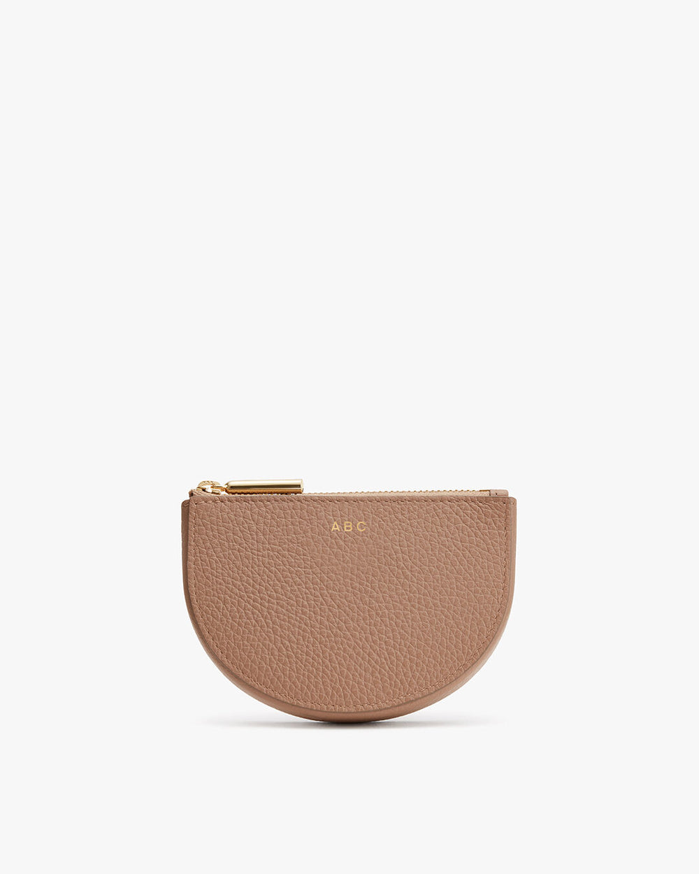 Small half-moon shaped pouch with zipper and personalized initials.
