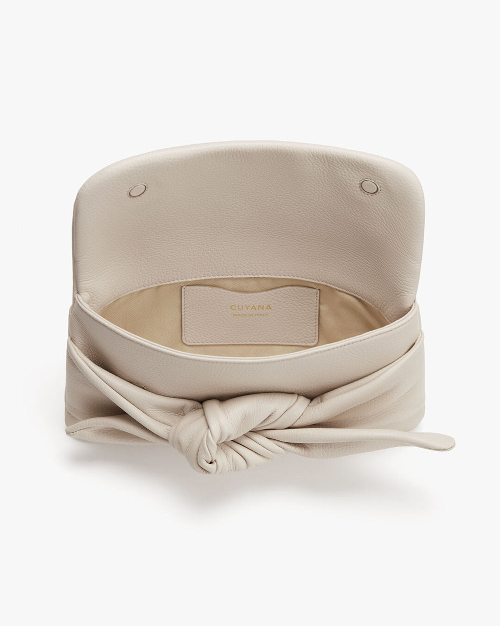 Open handbag with a knotted design detail on front.
