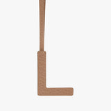 Leather lanyard with a rectangular tag.